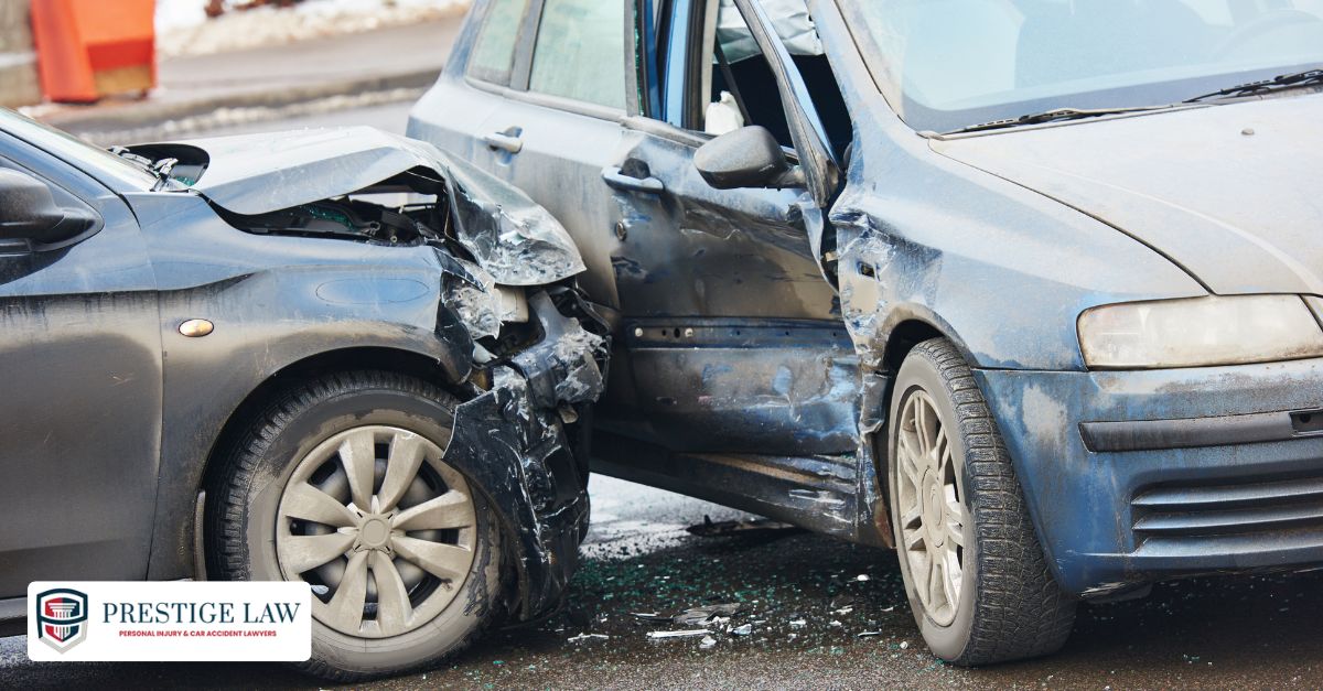 Two drivers stand beside their damaged cars after a minor accident