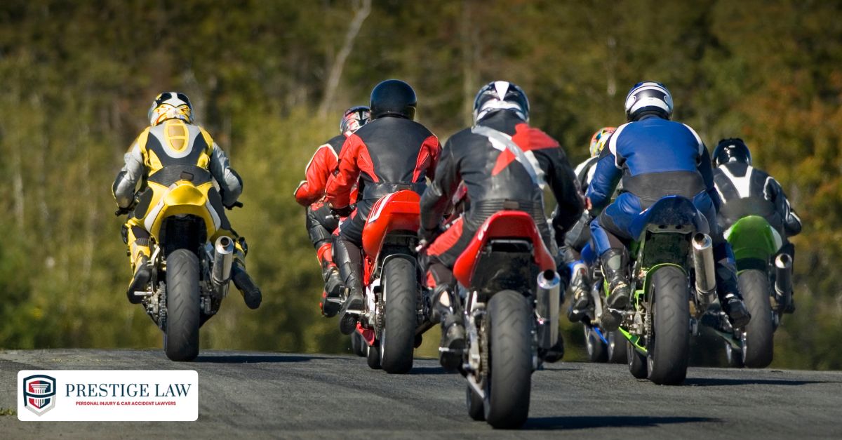 Motorcycle instructor guiding beginner riders through a safety course