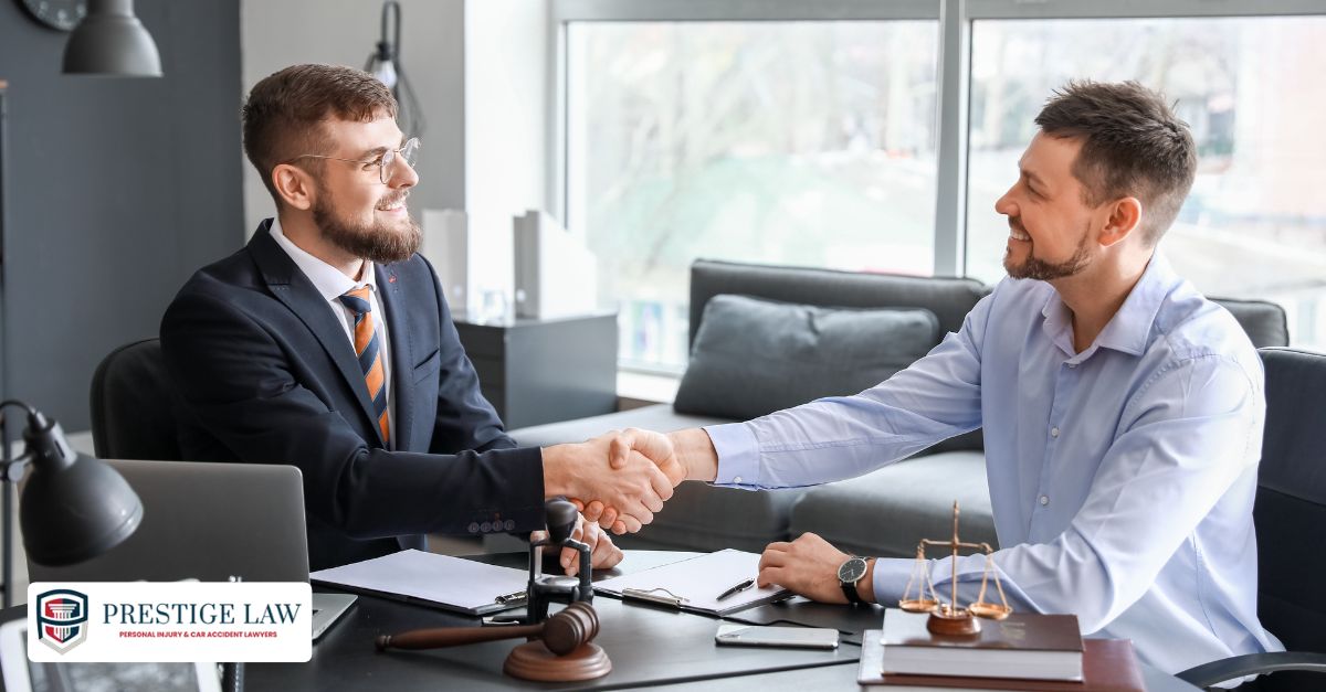 Lawyer and client shaking hands after winning a case under a contingency fee agreement.