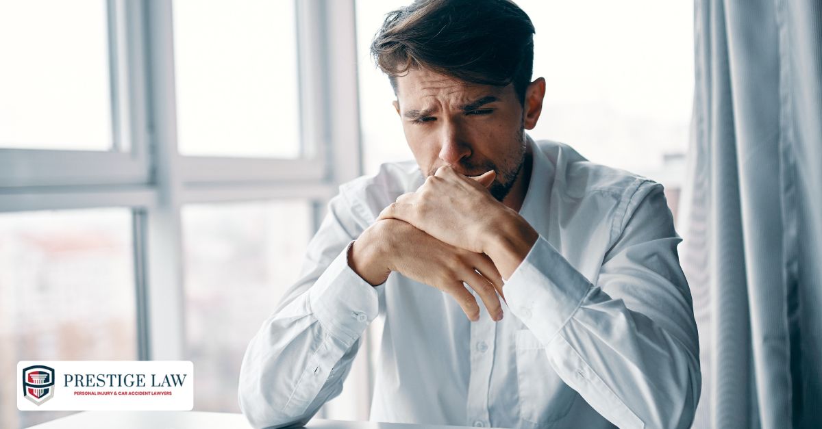 Person reading a legal summons after a car accident