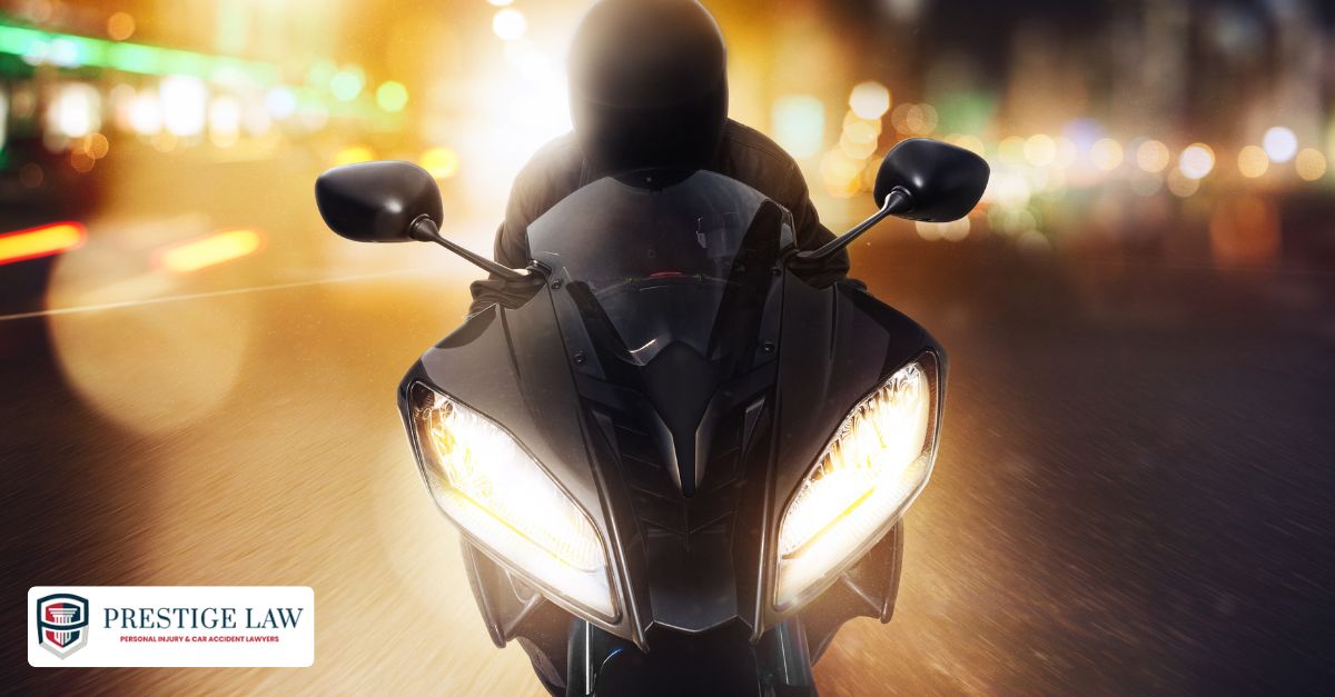 California Law on Motorcycle Wheelies Explained Motorcyclist performing a wheelie while being pursued by a marked police car