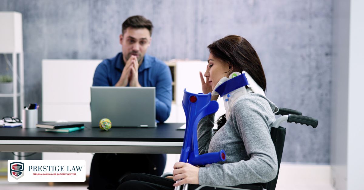 Attorney at Prestige Law Firm consulting with a family about a catastrophic injury case